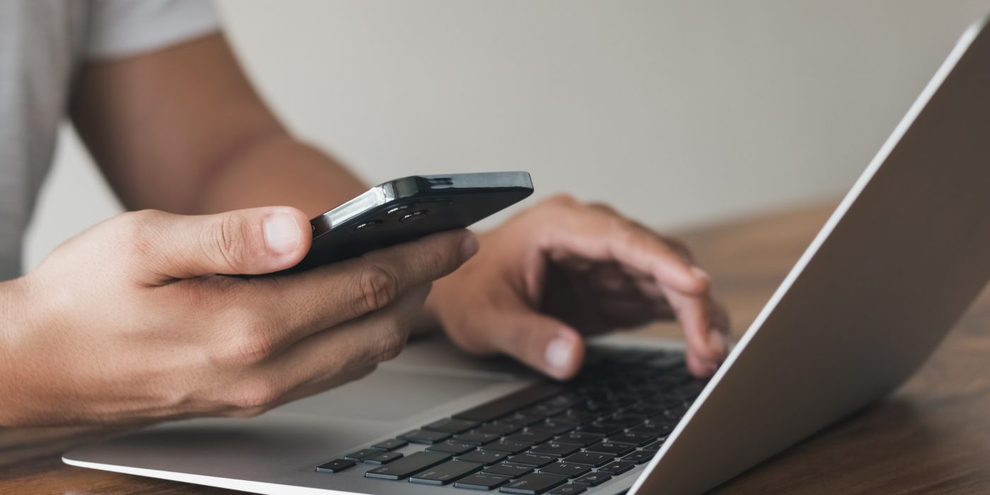 Work using mobile phone typing computer mobile chat laptop contact us at workplaces, planning ideas investors internet searching, ideas connecting people.