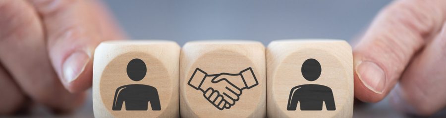 Concept of collaboration on wooden blocks
